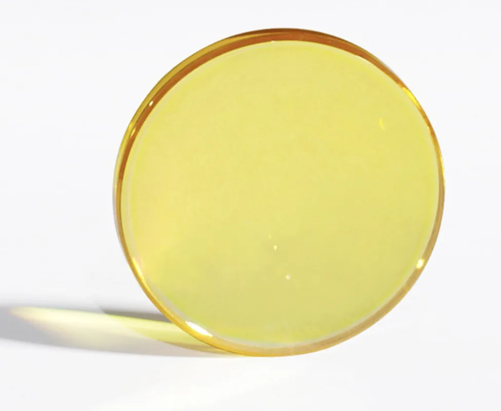 Polished round ZnSe window standing upright